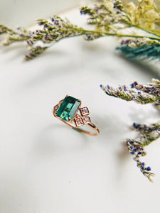 Bluish Green Tourmaline with checked diamond studded side