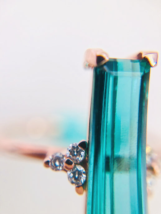 Stylistic Greenish Blue Tourmaline with diamond