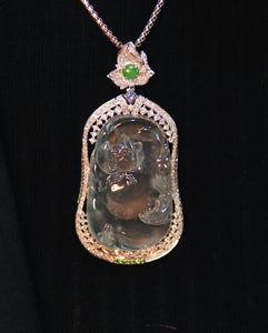 Glassy Sky Blue Jadeite pendant with lotus and fish motifs