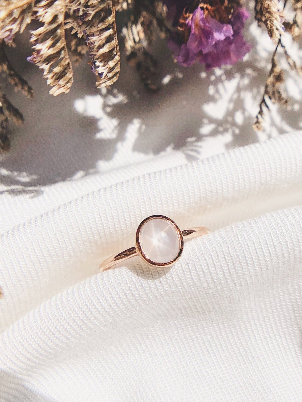 Oval Natural White Star Sapphire Ring in Rose Gold