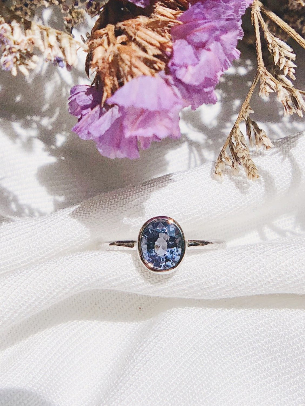 0.8ctw Oval Natural Purplish Blue Sapphire Ring in White Gold